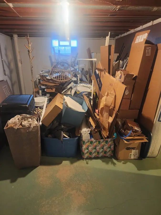 Roll-off dumpster container at job site for 8 Yard Dumpster Rental in Hopkinton